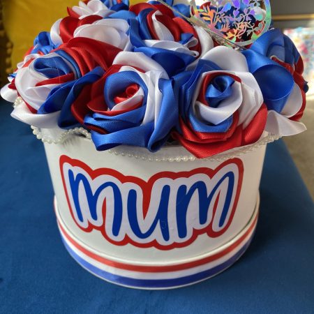 Medium sized round box of hand made Ribbon Roses