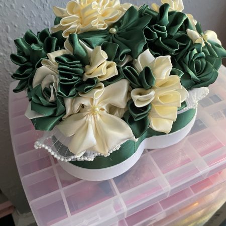 Medium sized heart shaped box of handmade Ribbon Flowers.