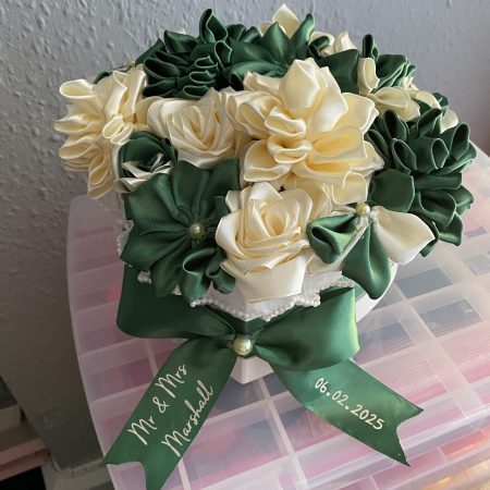 Medium sized heart shaped box of handmade Ribbon Flowers.