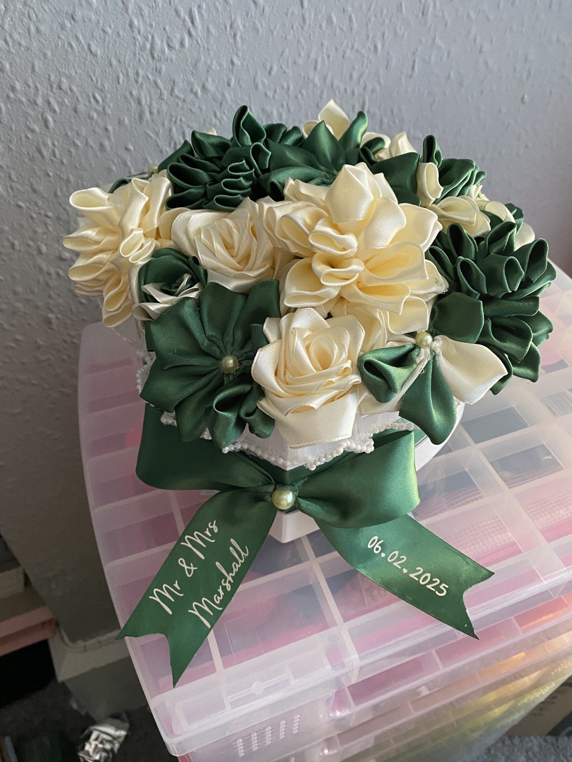Medium sized heart shaped box of handmade Ribbon Flowers.
