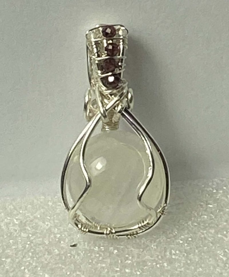 Wire-wrapped moonstone and garnet pendant