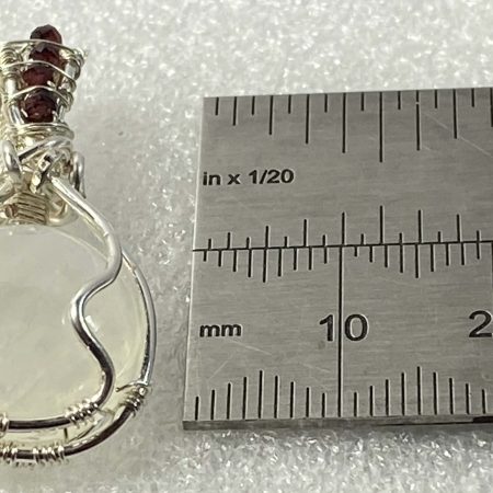 Wire-wrapped moonstone and garnet pendant