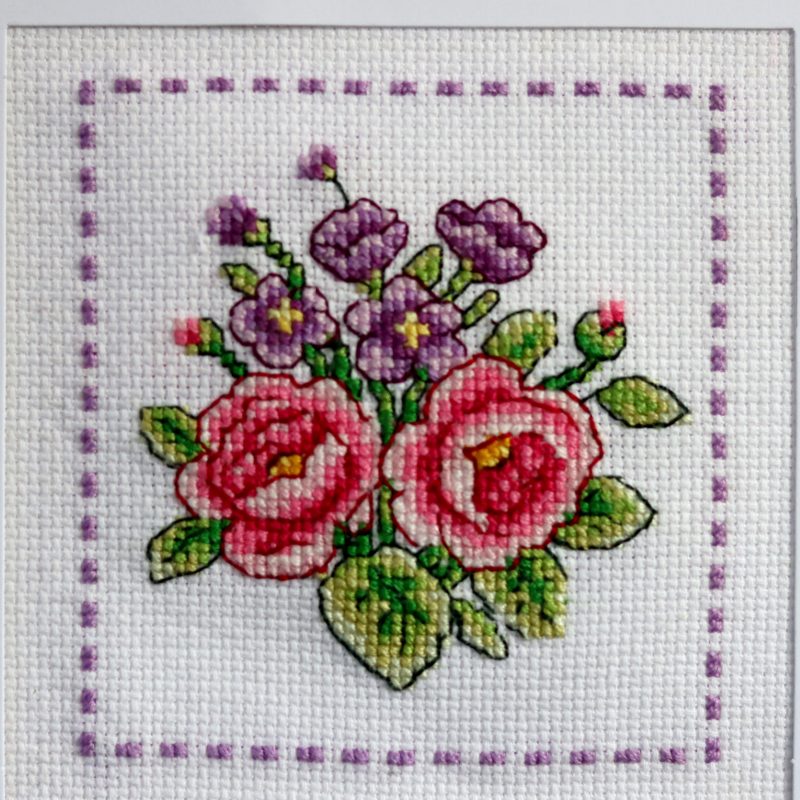 A Handmade Cross Stitch Greetings card framed in a White Aperture card left black inside for you to add your own personal message for any loved one