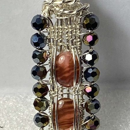 Unique wire-wrapped pendant with abalone shell and crystals