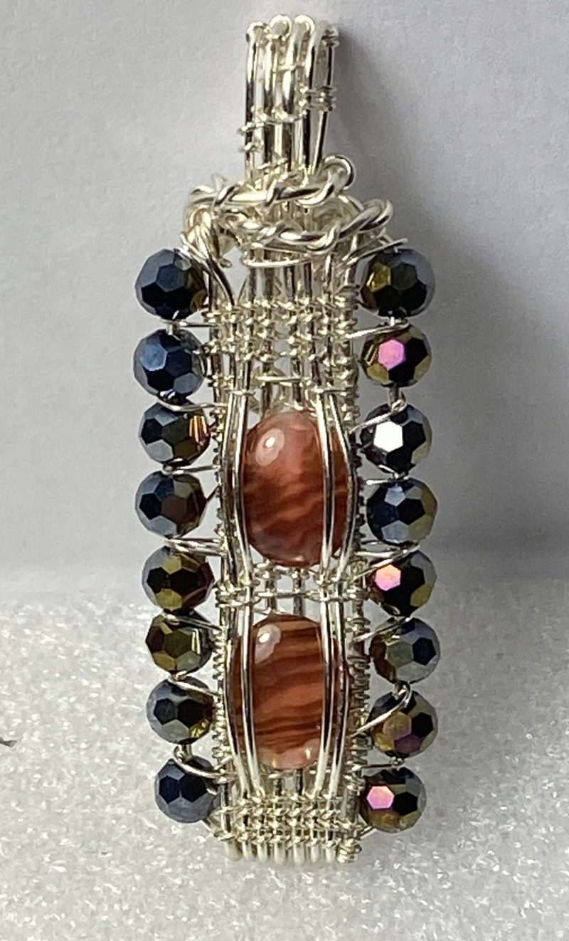 Unique wire-wrapped pendant with abalone shell and crystals