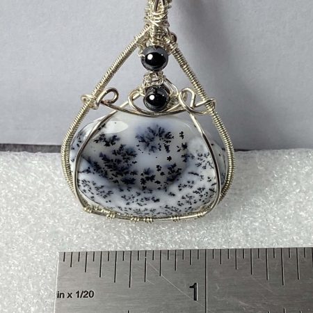 Absolutely stunning dendritic chalcedony wrapped in silver plated wire with haematite detail
