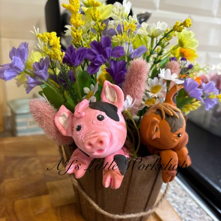 Handmade Pigs in a Bucket with Flowers