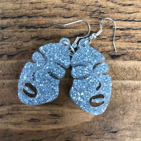 Glow in the dark face earrings