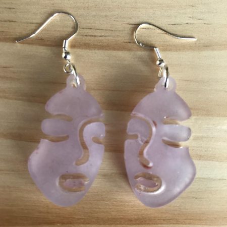 Glow in the dark face earrings