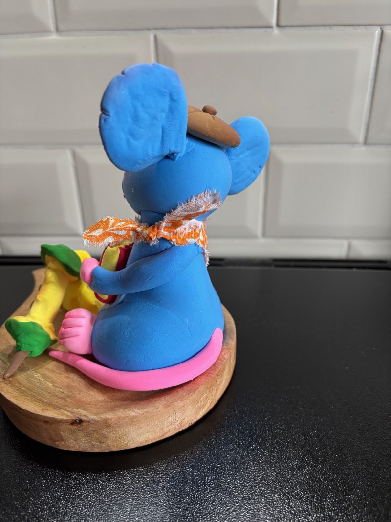 Handmade Cheeky Mouse eating Cheese and Apple made from Foam Clay on a Wooden Base