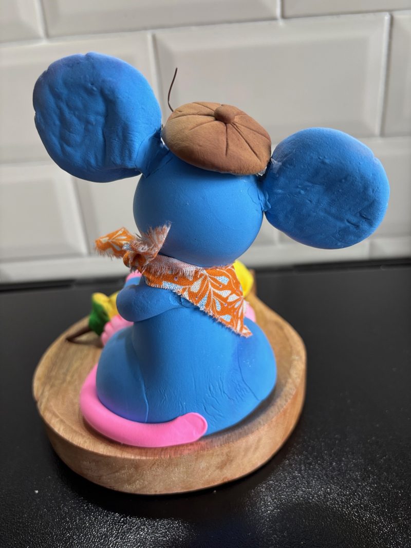 Handmade Cheeky Mouse eating Cheese and Apple made from Foam Clay on a Wooden Base