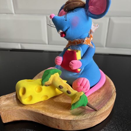 Handmade Cheeky Mouse eating Cheese and Apple made from Foam Clay on a Wooden Base