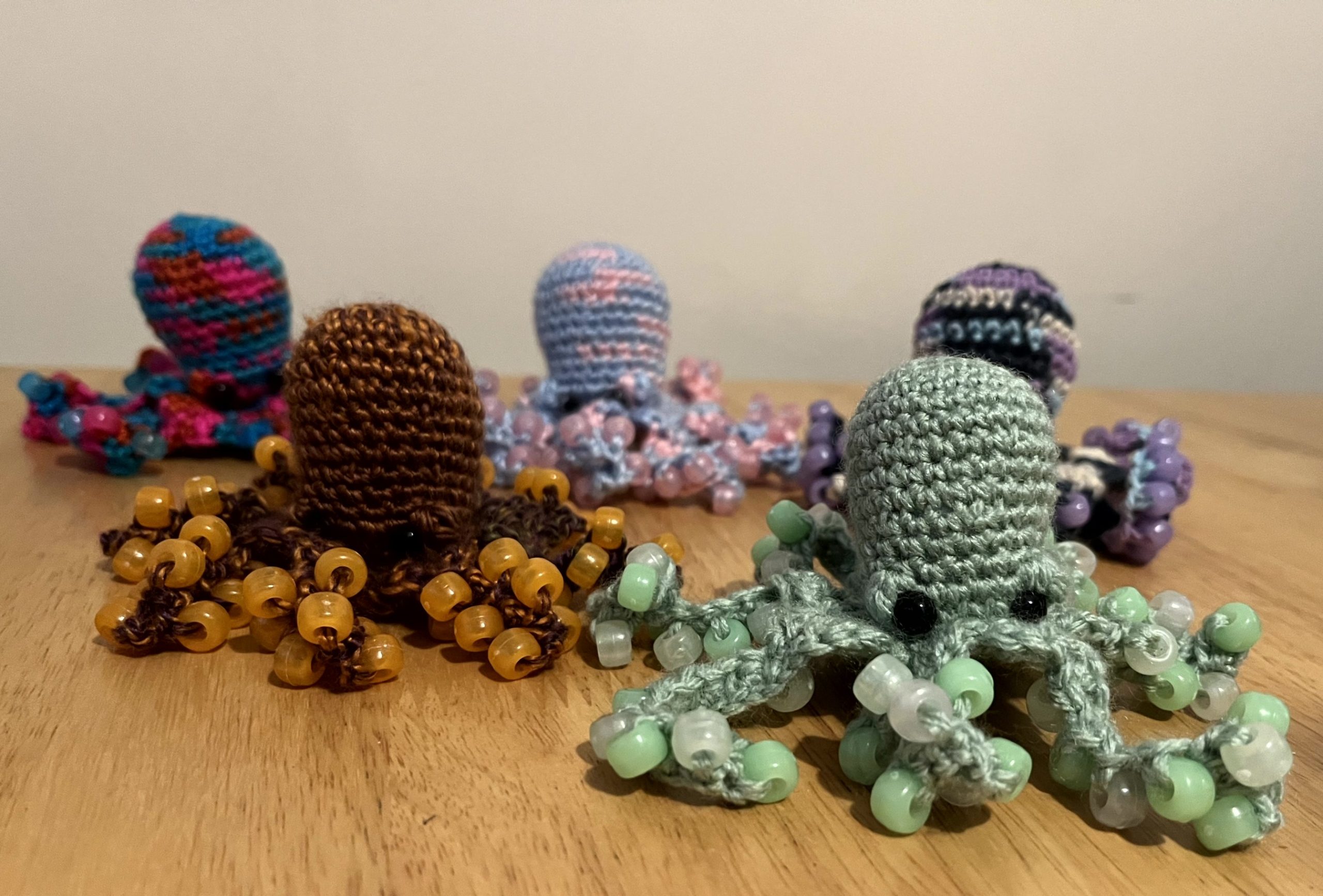 Small handmade crocheted beaded fidget toy octopus - various colours