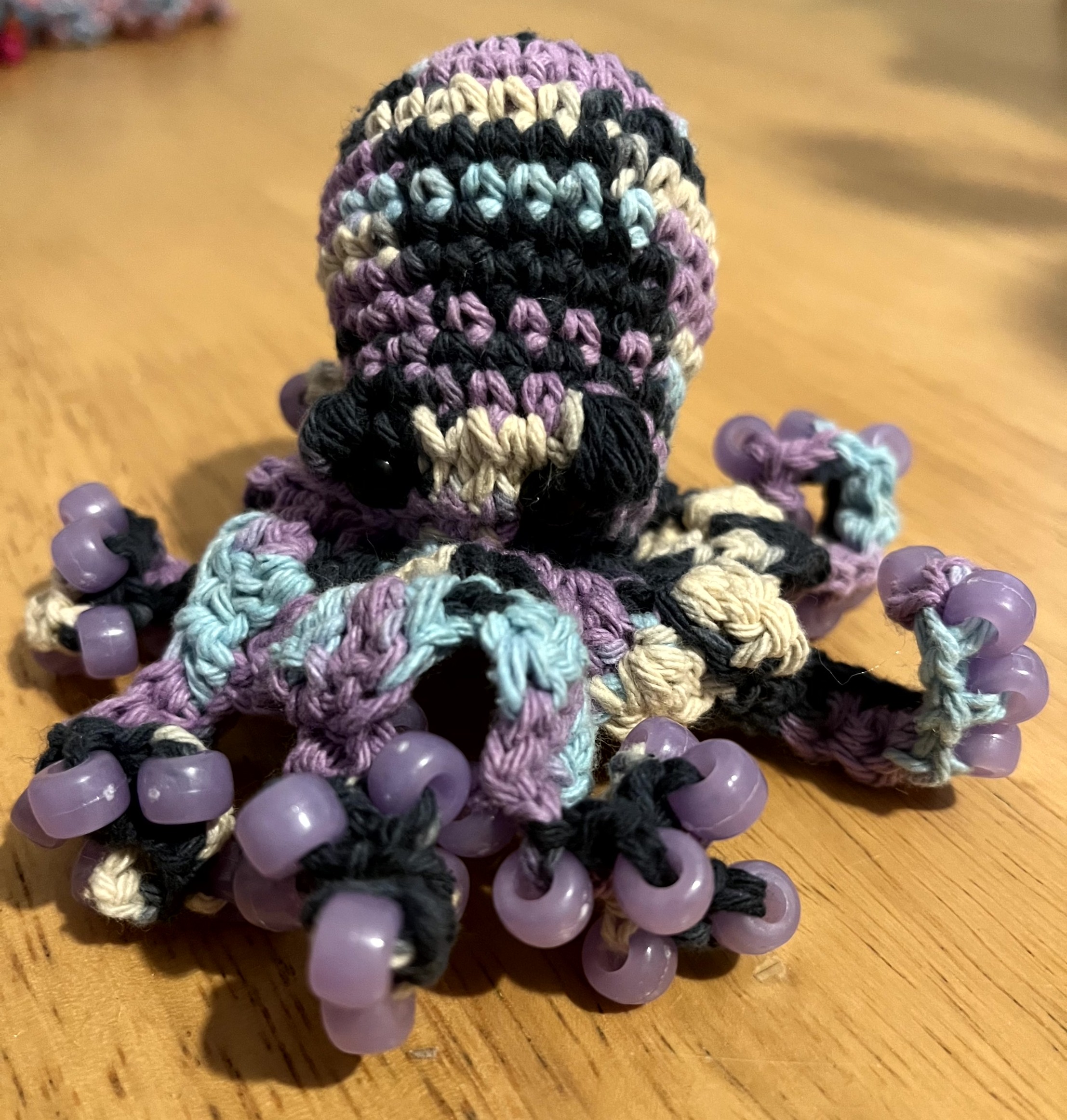Small handmade crocheted beaded fidget toy octopus - various colours