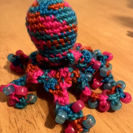 Small handmade crocheted beaded fidget toy octopus - various colours