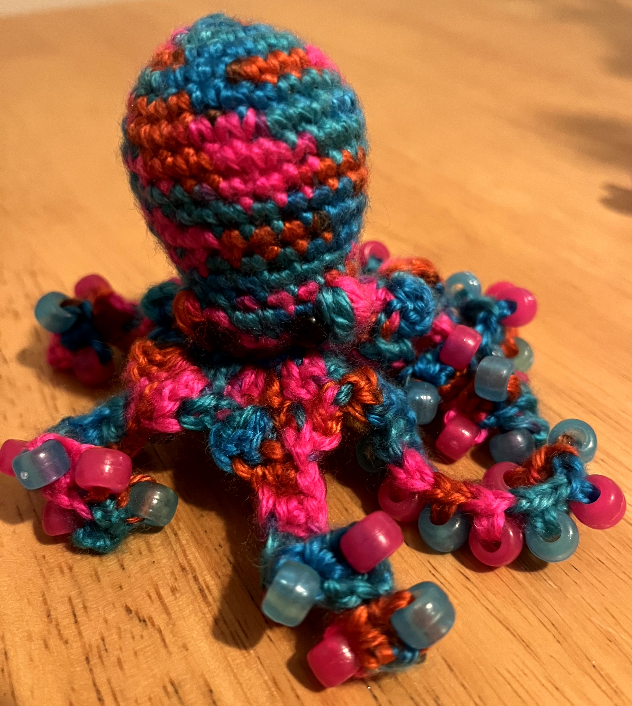 Small handmade crocheted beaded fidget toy octopus - various colours