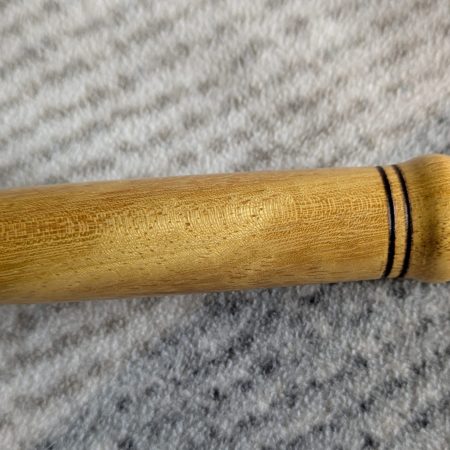 Handmade Iroko bottle opener with a stainless steel opener