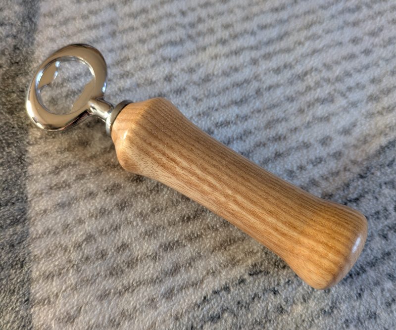 Handcrafted Ash bottle opener with a stainless steel opener