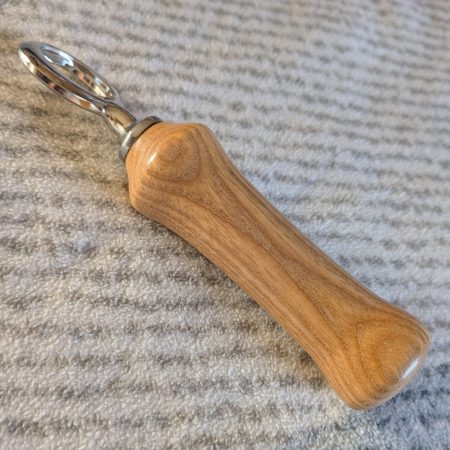 Handcrafted Ash bottle opener with a stainless steel opener