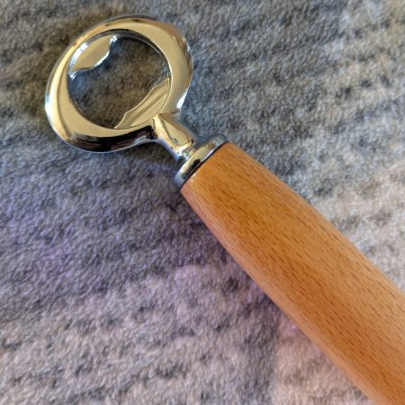 Bottle opener made from Beech wood with a stainless steel opener
