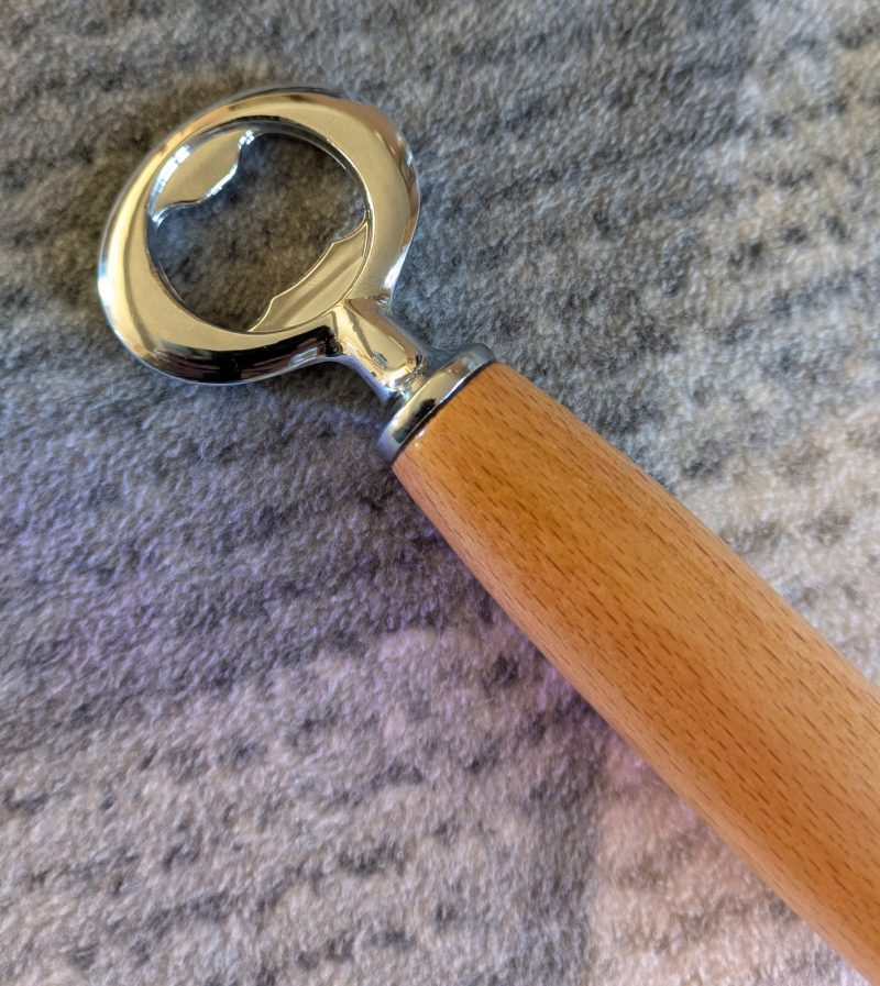 Bottle opener made from Beech wood with a stainless steel opener
