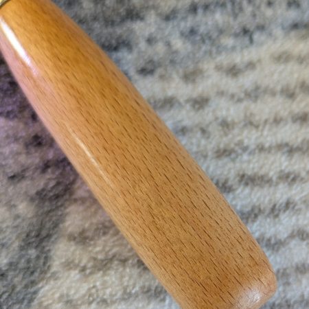 Bottle opener made from Beech wood with a stainless steel opener