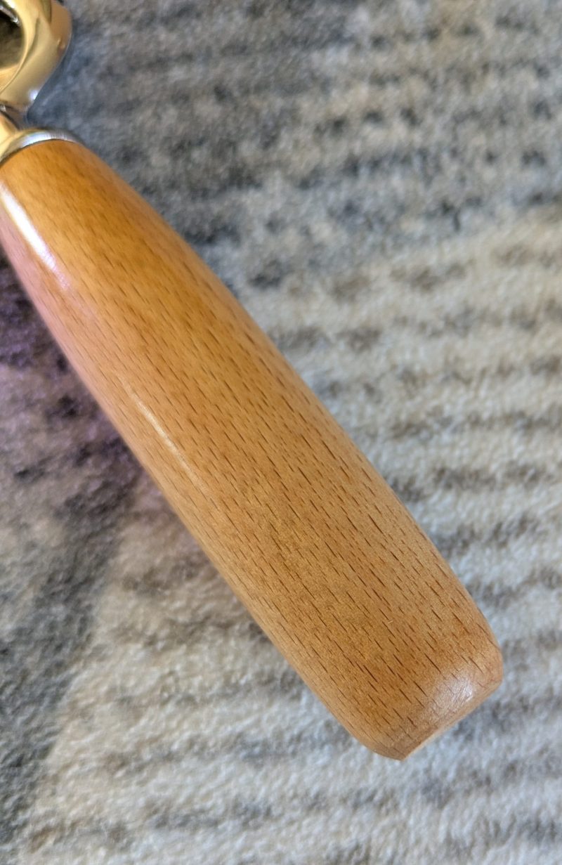 Bottle opener made from Beech wood with a stainless steel opener