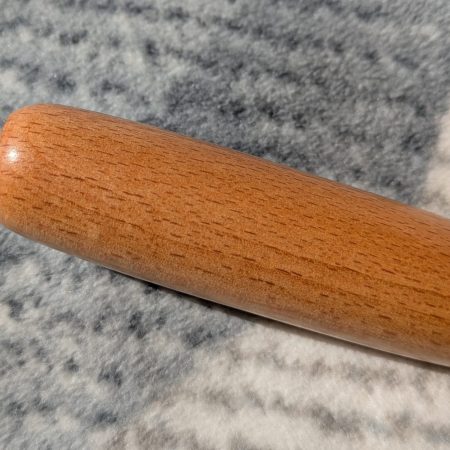 Bottle opener made from Beech wood with a stainless steel opener
