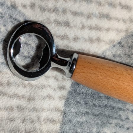 Bottle opener made from Beech wood with a stainless steel opener