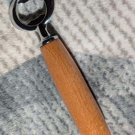 Bottle opener made from Beech wood with a stainless steel opener