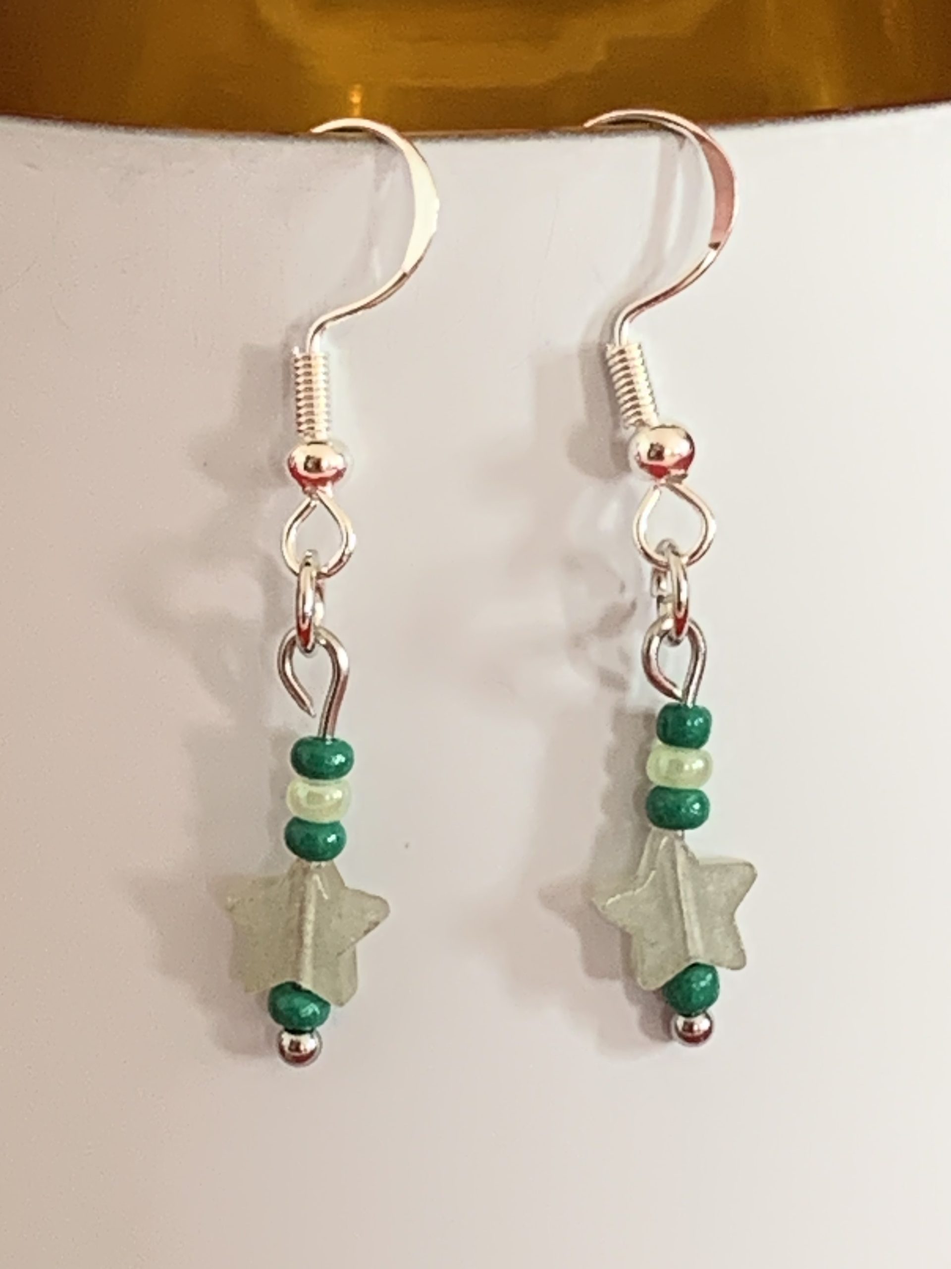 Lovely handmade sterling silver earrings with green stone stars & beads in a bottle with scroll