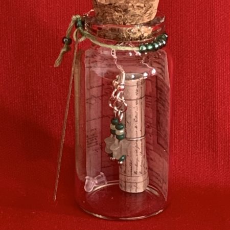 Lovely handmade sterling silver earrings with green stone stars & beads in a bottle with scroll