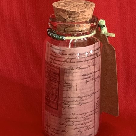 Lovely handmade sterling silver earrings with green stone stars & beads in a bottle with scroll