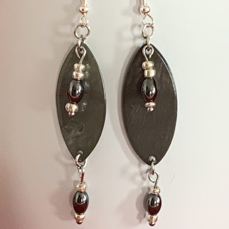 Lovely handmade sterling silver earrings with Hematite coloured beads in a bottle with scroll