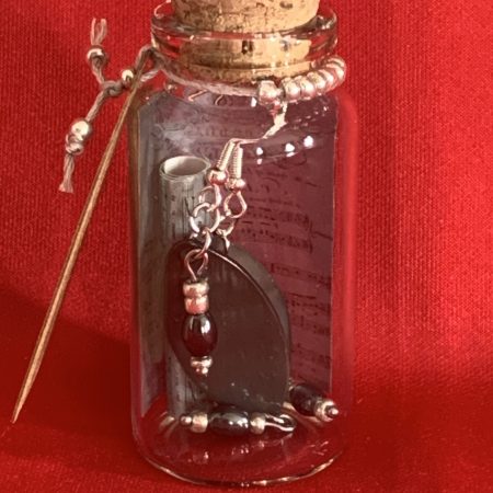 Lovely handmade sterling silver earrings with Hematite coloured beads in a bottle with scroll