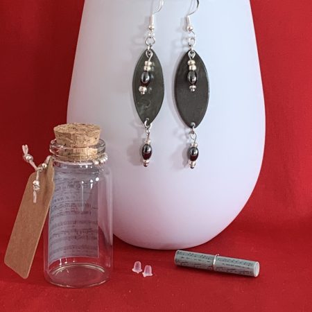 Lovely handmade sterling silver earrings with Hematite coloured beads in a bottle with scroll