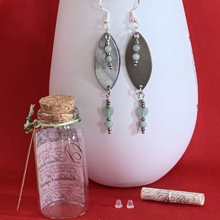 Lovely handmade sterling silver earrings with green stone hearts & beads in a bottle with scroll