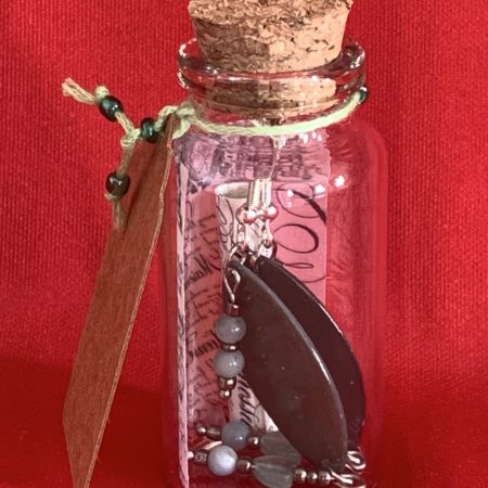 Lovely handmade sterling silver earrings with green stone hearts & beads in a bottle with scroll