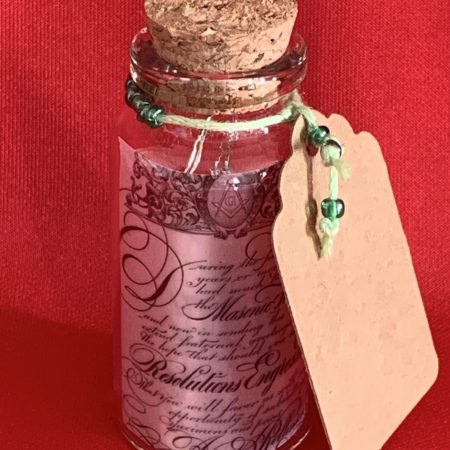 Lovely handmade sterling silver earrings with green stone hearts & beads in a bottle with scroll