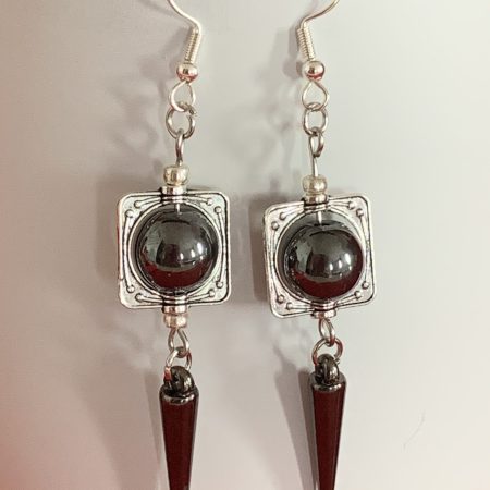 Lovely handmade sterling silver earrings with hematite coloured beads and spear drops in a bottle