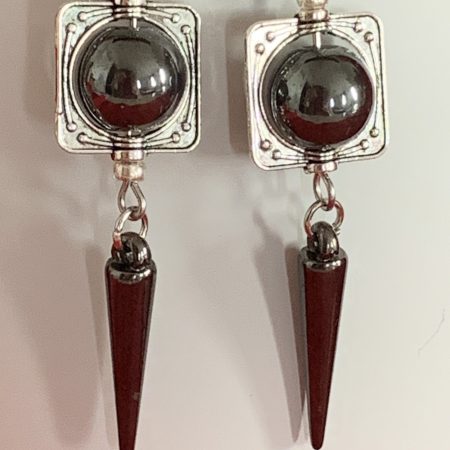 Lovely handmade sterling silver earrings with hematite coloured beads and spear drops in a bottle