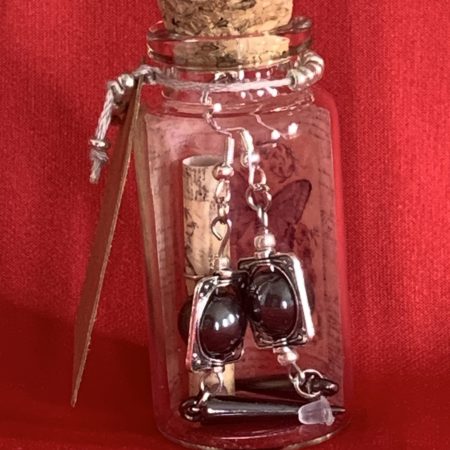 Lovely handmade sterling silver earrings with hematite coloured beads and spear drops in a bottle