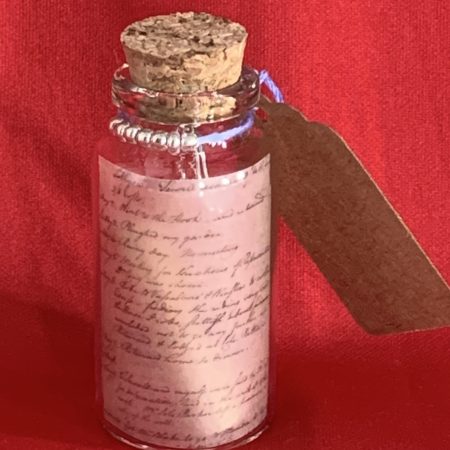 Lovely handmade sterling silver earrings with floral blue glass beads in a bottle with scroll