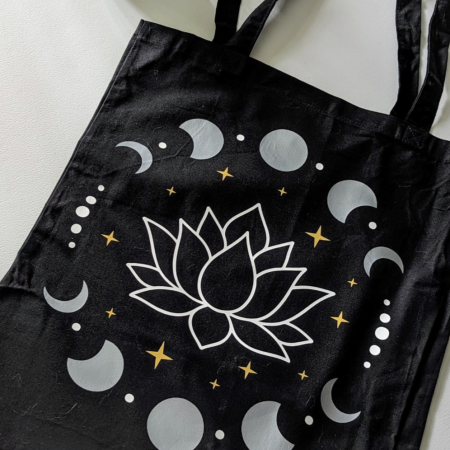 Black Tote Bag with A Mystical Lotus and Celestial Moon Phases design
