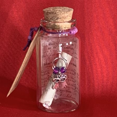 Lovely handmade sterling silver earrings with bows & beads in a bottle with scroll & gift tag