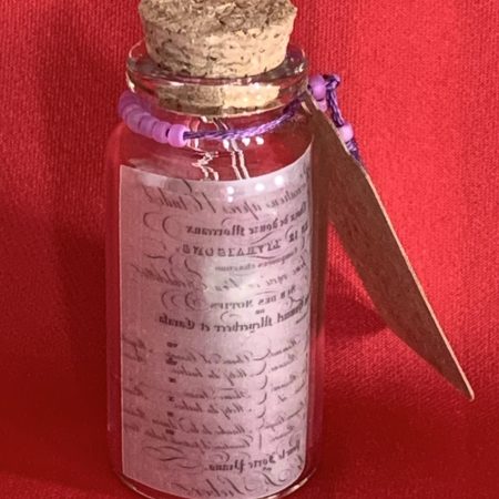 Lovely handmade sterling silver earrings with bows & beads in a bottle with scroll & gift tag