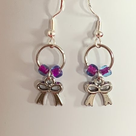Lovely handmade sterling silver earrings with bows & beads in a bottle with scroll & gift tag
