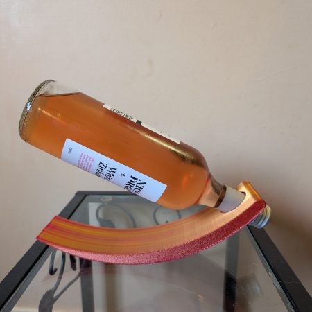 3D printed wine bottle holder and laser engraved bottle openers