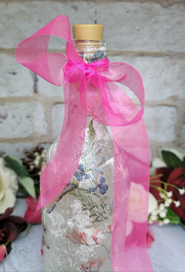 Decoupage Fairy bottle lamp - Pink cerise organza ribbon, tied around the neck of a wine bottle, flower design on the side of the bottle