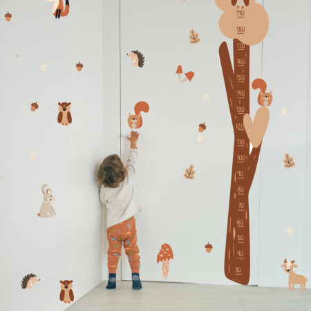 image of a woodland family height chart with child